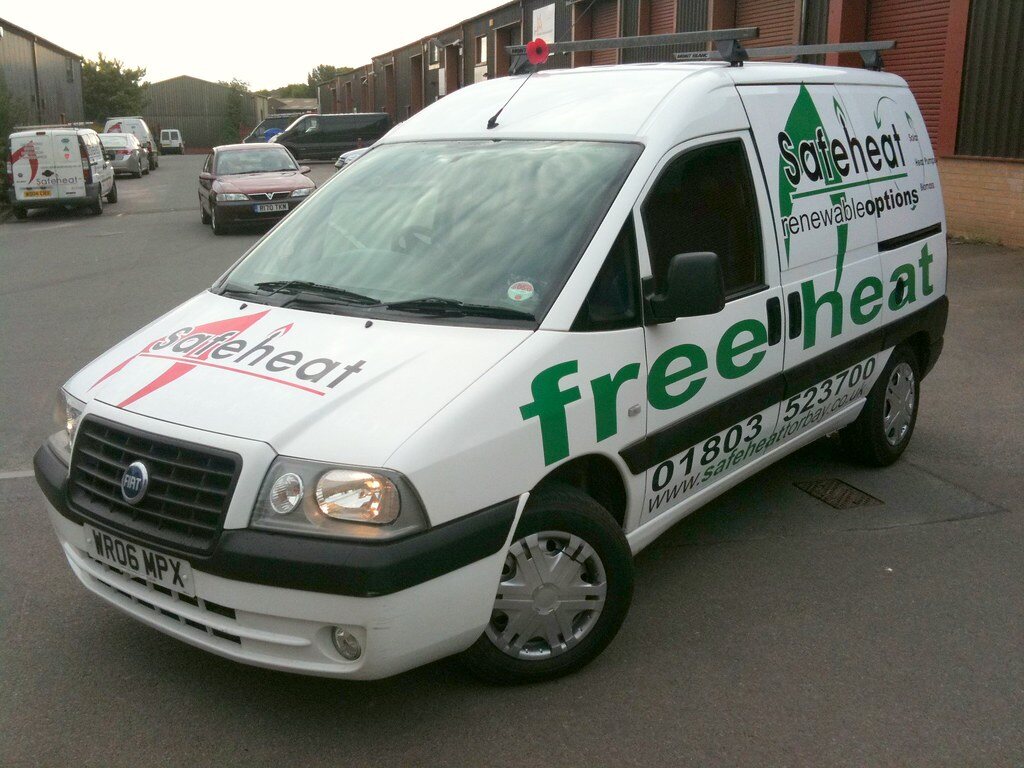 A white Safeheat van in Safeheat and Safeheat Renewable Options livery